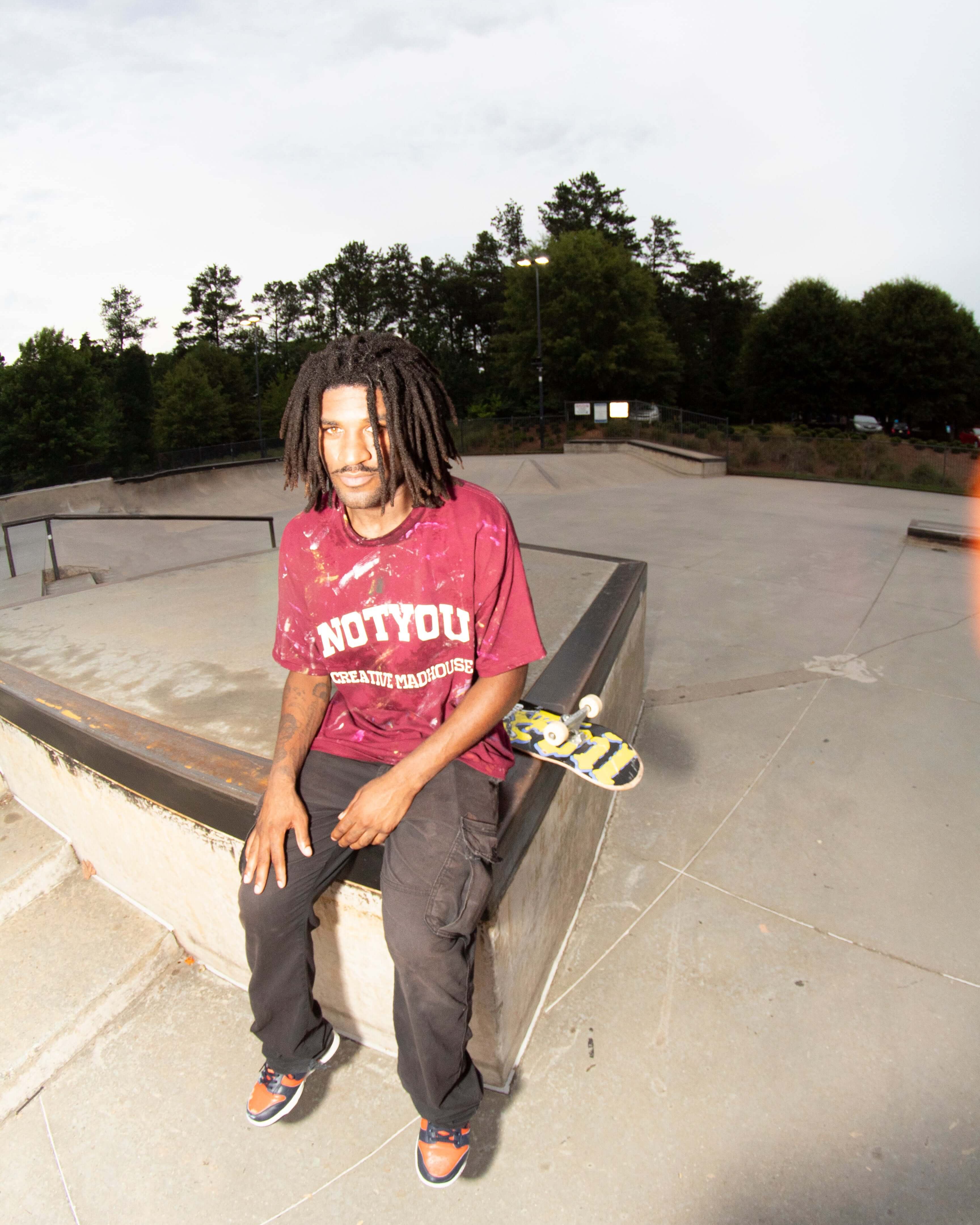 Model wearing "Creative MadHouse" Red T-Shirt