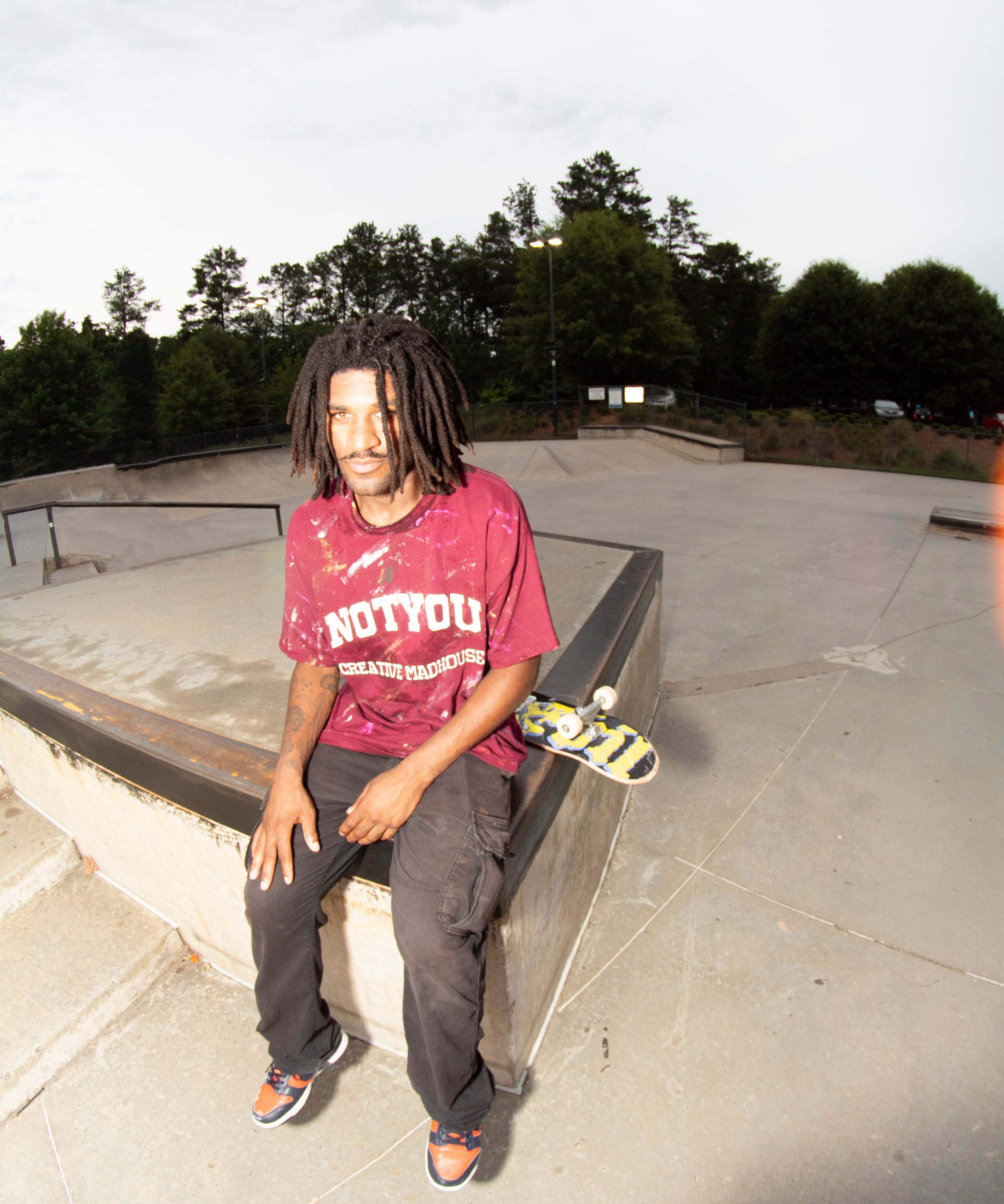 Model wearing "Creative MadHouse" Red T-Shirt