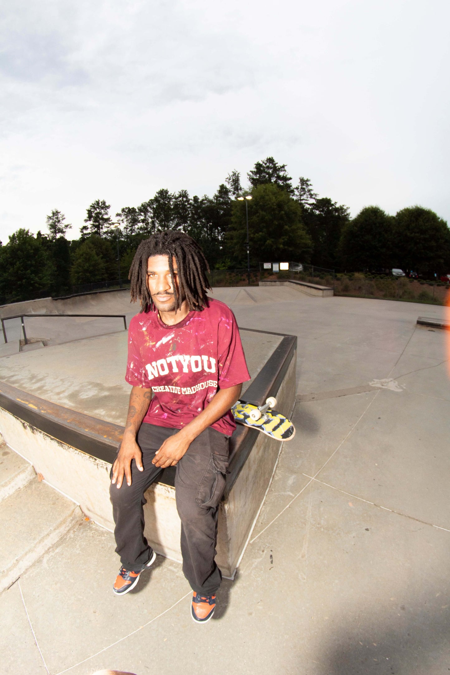 Model wearing "Creative MadHouse" Red T-Shirt